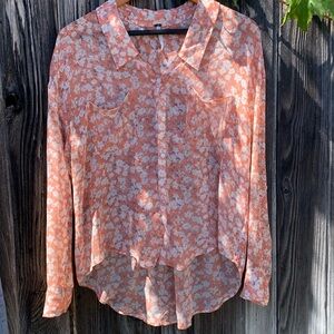 Free people peach and white floral flowy and sheer button up shirt. Small.